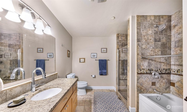 full bathroom with tile patterned floors, vanity, independent shower and bath, and toilet