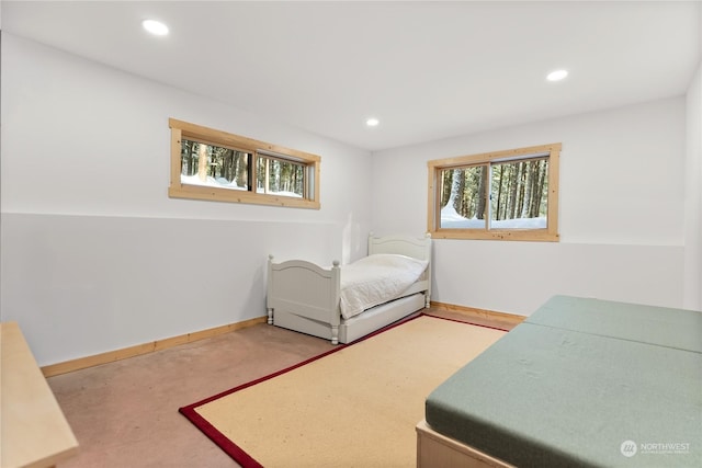 living area featuring concrete flooring