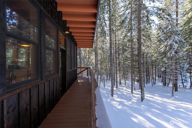 view of snow covered property