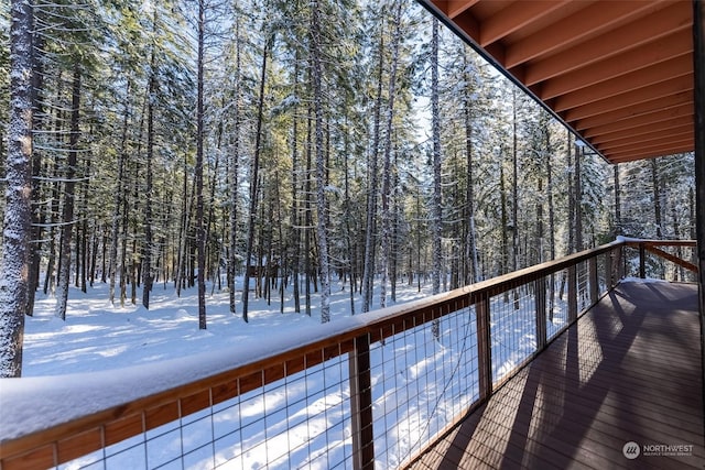 view of snow covered deck