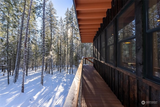 view of snow covered deck