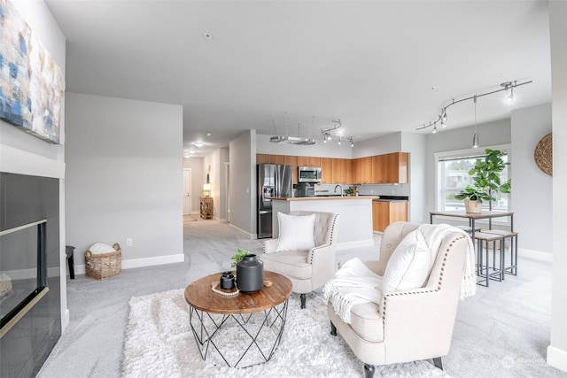 living room featuring light carpet