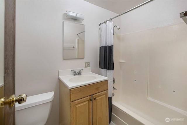 full bathroom with vanity, toilet, and shower / bathtub combination with curtain