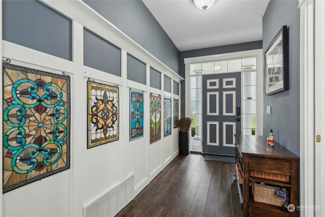 entrance foyer featuring dark hardwood / wood-style floors