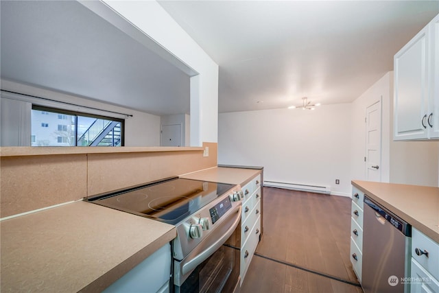 kitchen with stainless steel appliances, baseboard heating, a notable chandelier, white cabinets, and hardwood / wood-style floors