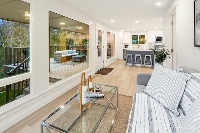 living room featuring light wood-type flooring