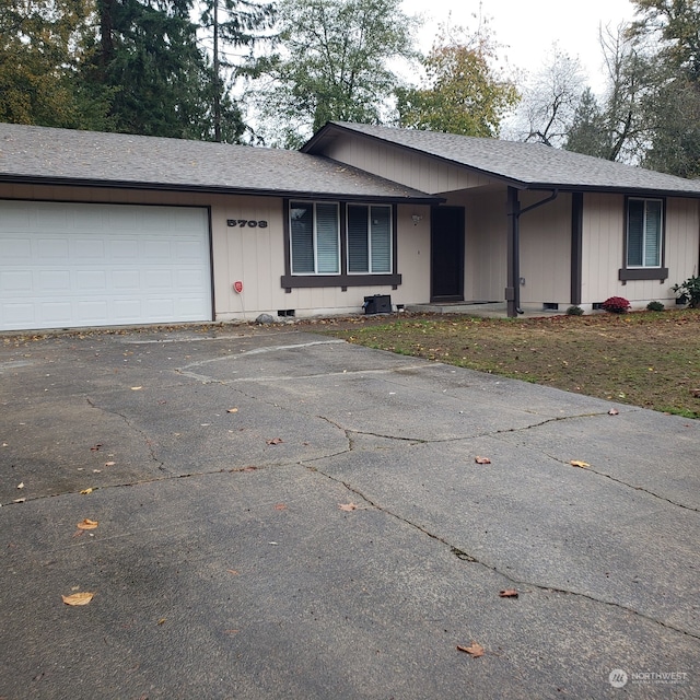 single story home with a garage