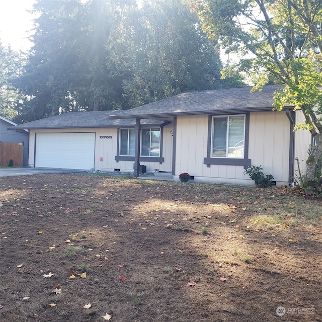 single story home with a garage