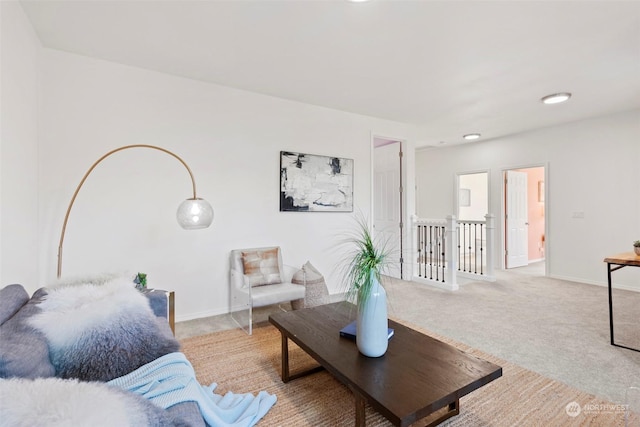 living room featuring light carpet