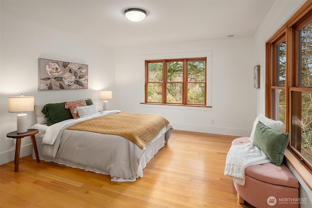 bedroom featuring light wood-type flooring