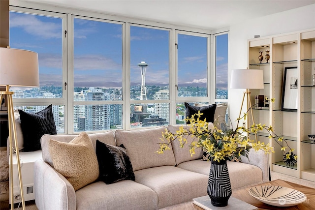 living room featuring a wall of windows