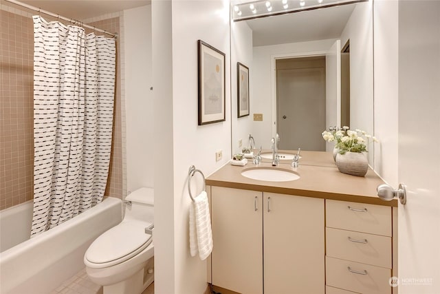 full bathroom with vanity, toilet, and shower / tub combo