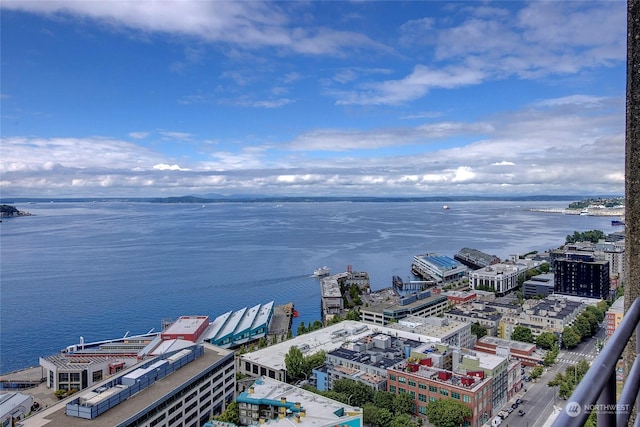 birds eye view of property featuring a water view