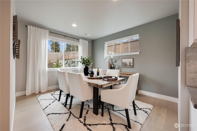 dining area featuring light hardwood / wood-style flooring