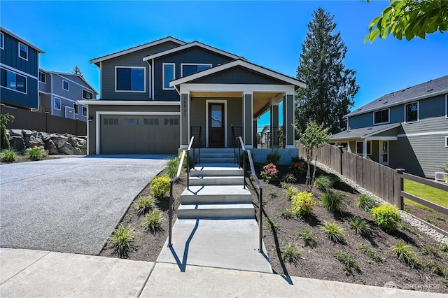 26521 NE 147th Pl Unit Sr 11, Duvall, WA 98019 - view of front of home with asphalt driveway, an attached garage, and a porch