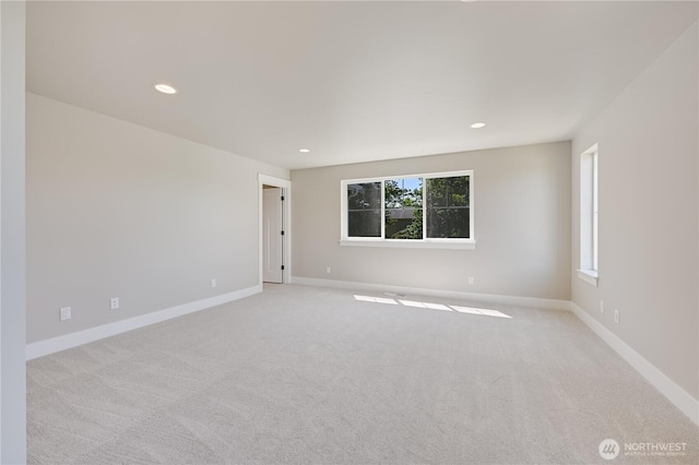 26521 NE 147th Pl Unit Sr 11, Duvall, WA 98019 - unfurnished room featuring light colored carpet, baseboards, and recessed lighting