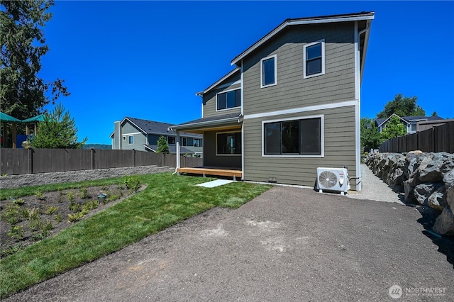 26521 NE 147th Pl Unit Sr 11, Duvall, WA 98019 - rear view of house with a cooling unit and a patio