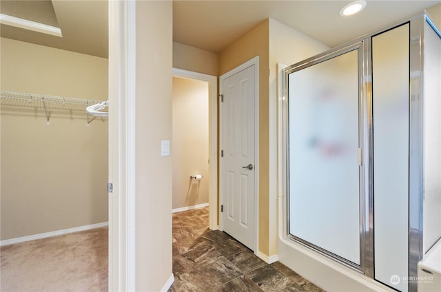 bathroom with an enclosed shower