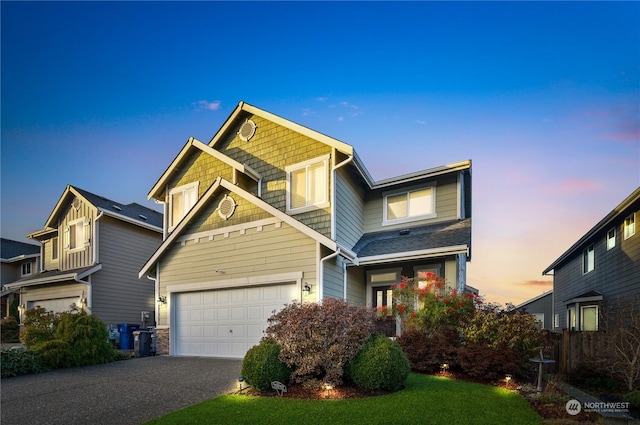 craftsman-style house with a garage