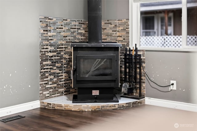 interior details featuring a wood stove