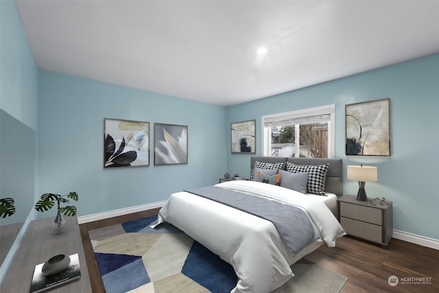 bedroom featuring dark hardwood / wood-style flooring