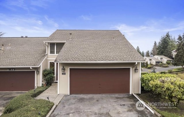 view of front property with a garage