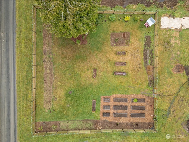 birds eye view of property featuring a rural view