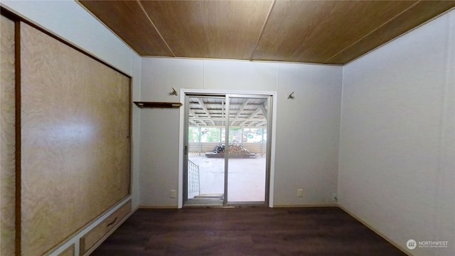 unfurnished room featuring wooden ceiling