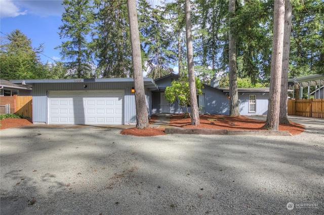 single story home with a garage