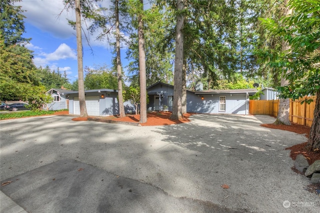 ranch-style home with a garage