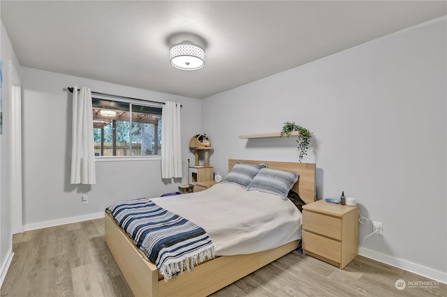 bedroom featuring light hardwood / wood-style flooring