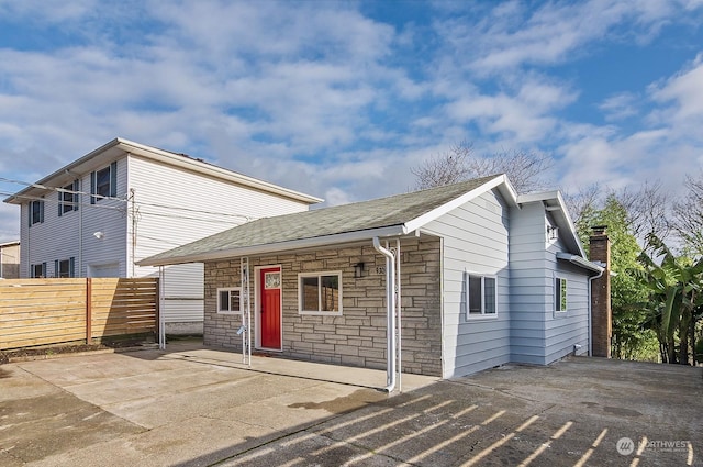 view of front of property with a patio