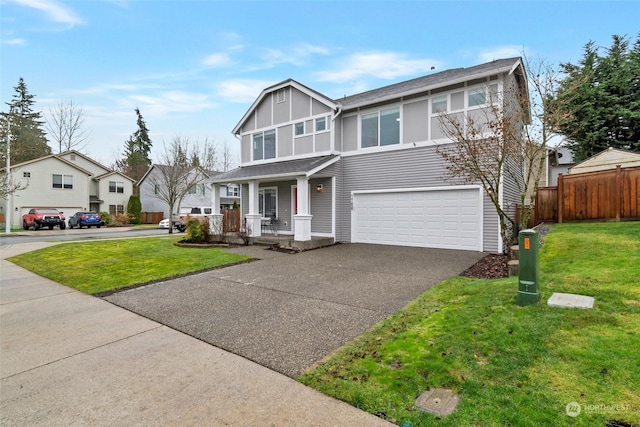 view of front of home featuring a porch, a garage, and a front lawn