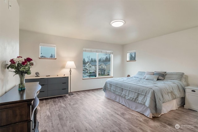 bedroom featuring light wood-type flooring