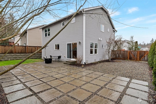 back of property with a patio area