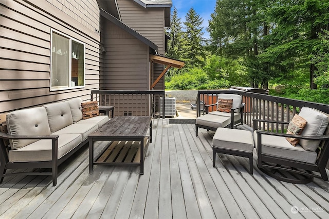 deck featuring outdoor lounge area