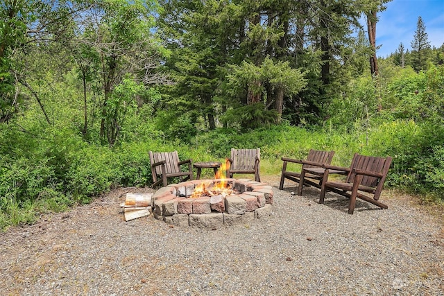 view of patio with an outdoor fire pit