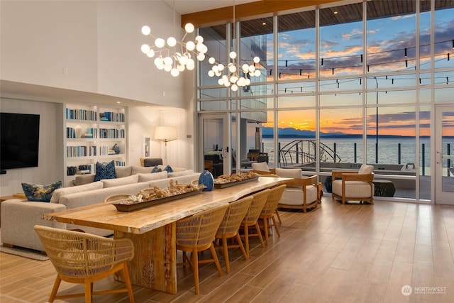 1250 Alki Ave SW Unit 3B, Seattle, WA 98116 - lobby featuring a towering ceiling, floor to ceiling windows, and a water view