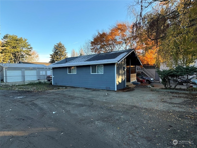 exterior space featuring an outbuilding