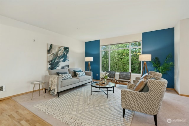 living room with light hardwood / wood-style flooring