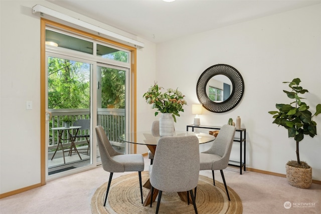 view of carpeted dining room