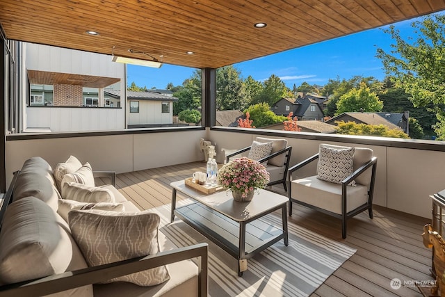 wooden deck featuring outdoor lounge area