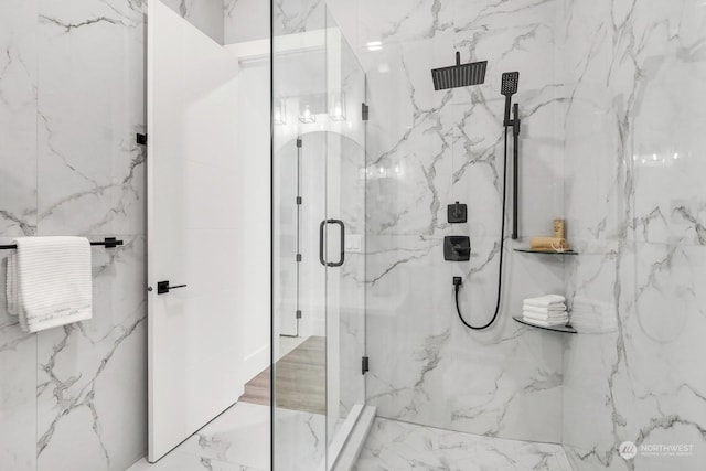 bathroom featuring an enclosed shower