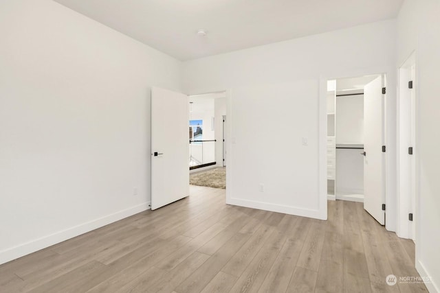 empty room with light wood-type flooring