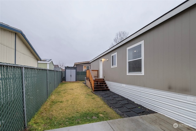 view of yard with a shed