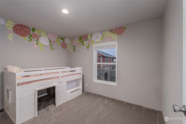 unfurnished bedroom featuring carpet floors