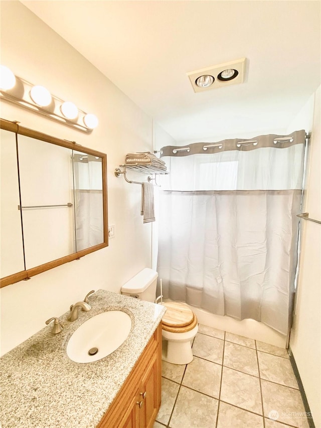 full bathroom with toilet, vanity, tile patterned floors, and shower / bathtub combination with curtain