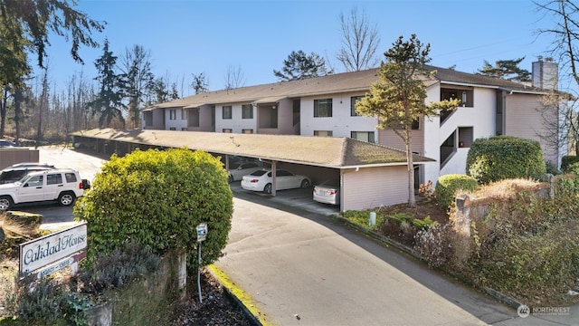 view of front of house featuring a carport