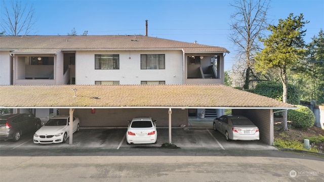 view of front of property with a carport