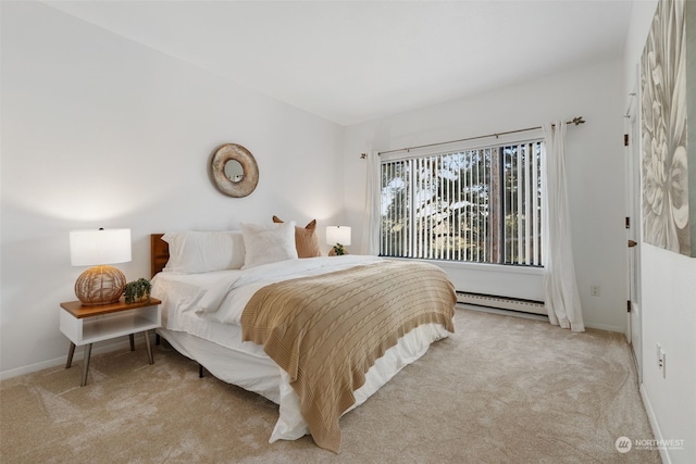 carpeted bedroom with baseboard heating